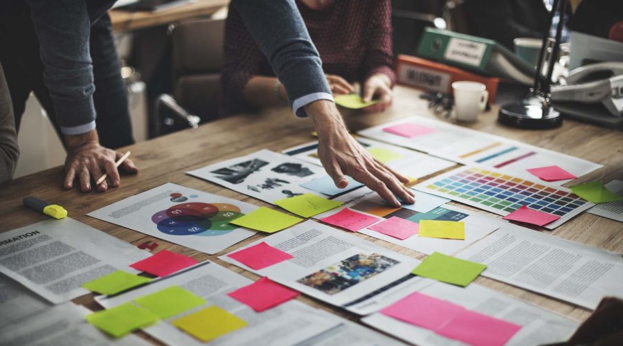 Staff discussing business objectives